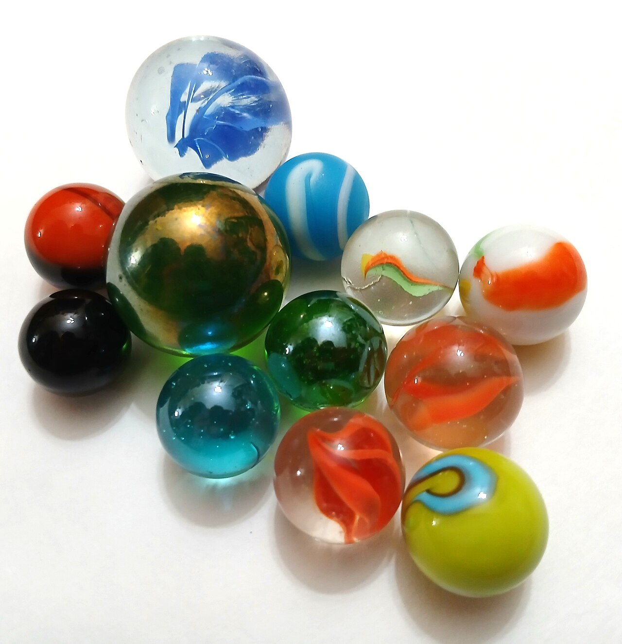 A handful of colorful glass marbles